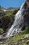 High waterfall in the mountains