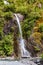 High waterfall near Franz Joseph Glacier. New Zealand