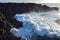 High waves at Los Hervideros in the evening sun. West coast of Lanzarote, Spain