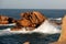 High waves at Pink Granite rock coast in Brittany