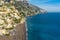 high and winding mountains, beach and sea typical of the town of Positano, Italy.