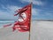 High winds cut the dangerous currents` warning flag