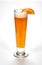 Highball tall glass of unfiltered white beer with a slice of orange over white background