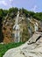 The highest 78 meters waterfall on Plitvice lakes in Croatia. A rock in the foreground