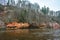 Highest devonian rock in Latvia - Kuku Ä¶Å«Ä·u cliffs - 43 metres during gloomy autumn day by the Gauja in Gauja National Park