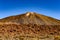 Highest Peak Behind Arid Lava Rocks On A Sunny And Very Clear Day In El Teide National Park. April 13, 2019. Santa Cruz De