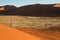 The highest sand dunes in the world at sunset in Namib Desert, in the Namib-Nacluft National Park in Namibia.