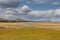 A highland river valley with yellow meadow at central mongolia