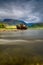 Highlands of Scotland landscape ,abandoned fisherman boat and Ben Nevis at sunset