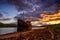 Highlands of Scotland landscape ,abandoned fisherman boat and Ben Nevis at sunset