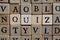 Highlighted QUIZ word made of wooden cubes.