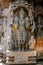 Highly detailed intrinsic carvings of deity with ornaments at Somnathpur, Karnataka, India
