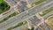 Highway aerial with cars and truck lorry moving aerial view 4k. Four lane local road traffic transport vehicles driving both