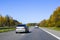 Highway, autobahn and road landscape. Automobile, cars and vehicles. Blue sky and sunny day. European autobahn