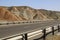 Highway through beautiful colorful mountains similar to eastern spices in Tabriz, Iran