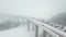 Highway bridge during a heavy snowfall