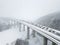Highway bridge during a heavy snowfall