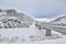 Highway with bridge through the snowy cliffs in mountains - beautiful winter landscape