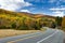 Highway Through Colorful Fall Countryside in New England