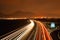 Highway D8 and Lovos hill on horizont in night on 16th january in czech republic