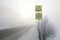 Highway in the foggy morning in winter