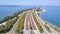 Highway or Freeway road. Ocean or Gulf of Mexico FL. Road for cars and truck. Low traffic on the way. Highway for any transportati