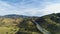 Highway and Hilly Rural Landscape. Kern County. California, USA. Aerial View