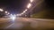 Highway hyperlapse. Defocusing flashlights cars traveling on the road.