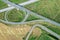 Highway intersections road between fields. aerial top view