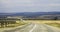 Highway landscape with moving cars at daytime