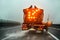 Highway maintenance gritter truck spreading de icing salt on road