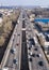 Highway with moving cars and trucks in the city Kiev, Ukraine. Aerial view from drone in a spring day.