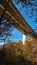 Highway overpass crossing Kamacnik canyon, towering high above wonderful forest during autumn season in Croatian mountains