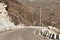 Highway road view of India China border near Nathu La mountain pass in Himalayas which connects Indian state Sikkim with China`s