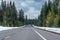 Highway running through forests of Oregon covered with snow USA