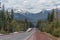 Highway running through forests of Oregon covered with snow USA