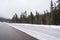 Highway running through forests of Washington covered with snow USA