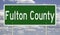 Highway sign for Fulton County Georgia