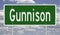 Highway sign for Gunnison Colorado