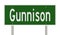 Highway sign for Gunnison Colorado