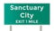 Highway sign for Sanctuary City