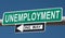 Highway sign for UNEMPLOYMENT and ONE WAY