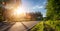 Highway into Silent Forest in spring with beautiful bright sun rays