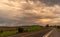 Highway in southern Brazil cutting fields in the Pampa biome at dusk