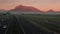 Highway traffic in Cape Town, with Table Mountain in the background, early in the morning.