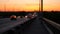 Highway traffic cars at night blur background. Cars moving on road on bridge evening. Freeway in the dark.