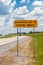 Highway warning sign about hitchhikers that might escaping inmates