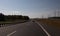 Highway wide road, transport and blue sky with clouds