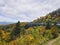 Highway winding through colorful mountains.