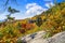 Highway winding through colorful mountains.